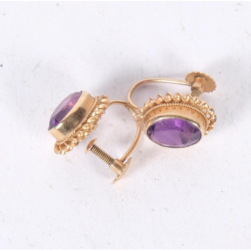 565 - A pair of 9ct gold amethyst earrings, with screw-back fittings, 2.7g