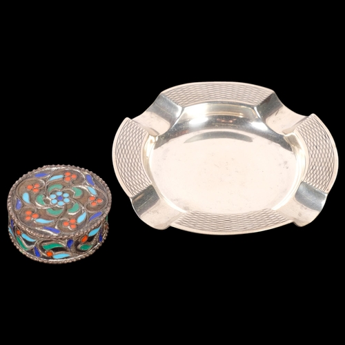 586 - A Mappin & Webb Elizabeth II silver ashtray, 8cm, and a sterling silver and enamel pillbox, 1.4oz to... 