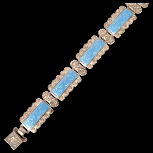 603 - An Art Deco silver and blue enamel floral panel bracelet, by Harmony, 18.5cm (clasp A/F)