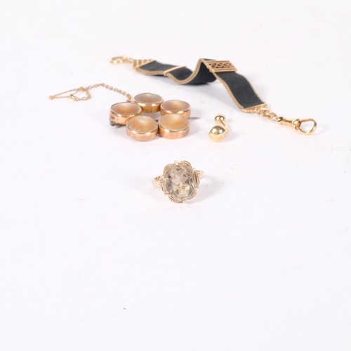 605 - A group of various 9ct jewellery, including a stone set ring, an opal brooch, fob, and a belly butto... 