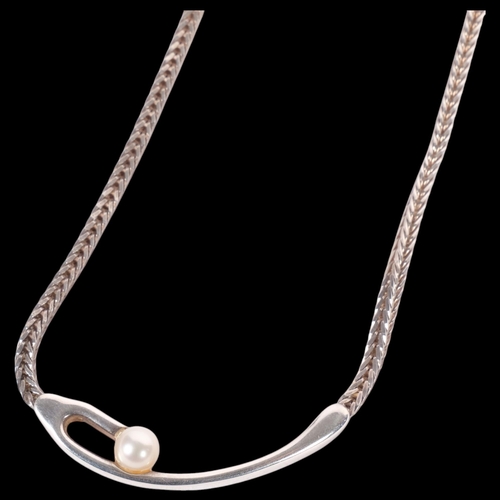 624 - JORGEN SANDBERG - a sterling silver and pearl set abstract necklace