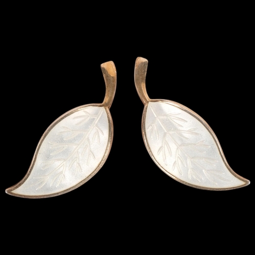 628 - MEKA - a pair of Danish modernist sterling silver-gilt white enamel leaf clip-on earrings, 32mm, 5.3... 