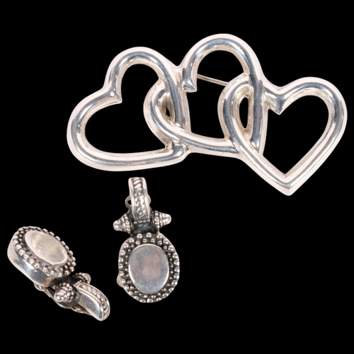 629 - A pair of Mexican sterling silver earrings, and a Mexican silver integrated 3-heart design brooch