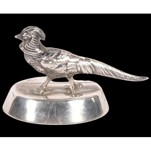 643 - SAMPSON MORDAN & COMPANY - a George V silver 'Pheasant' name/menu card holder, London 1923