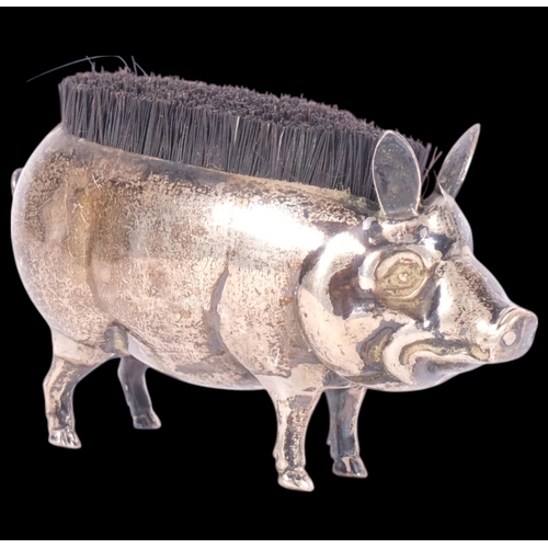 644 - An Edwardian silver novelty 'Pig' dip pen wipe, Britton, Gould & Co, Birmingham 1905, L7cm