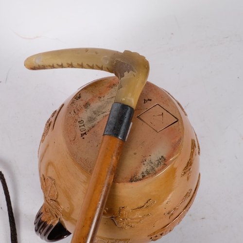 651 - A Victorian stoneware Harvest jug, H20cm, and a horn-handled riding whip