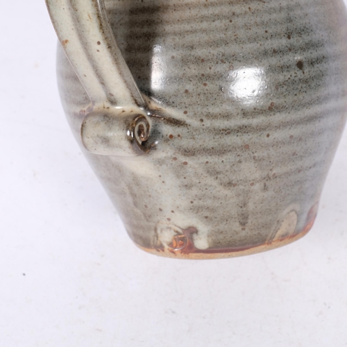 653 - A glazed Studio jug from the Leach Pottery, H20cm