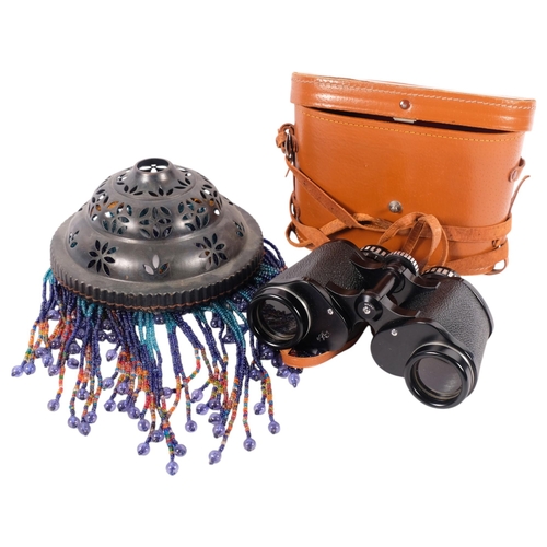 668 - Greenkat 8x40 binoculars, cased, and a pierced metal lamp shade with beaded drops, diameter 18cm