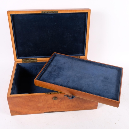 669 - An Antique flame veneered mahogany box, with tray-fitted interior, 38cm across