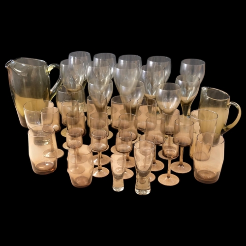 673 - A suite of Vintage grey glasses, including 2 jugs, tallest 20.5cm, probably Whitefriars, and other s... 