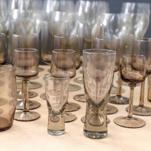 673 - A suite of Vintage grey glasses, including 2 jugs, tallest 20.5cm, probably Whitefriars, and other s... 