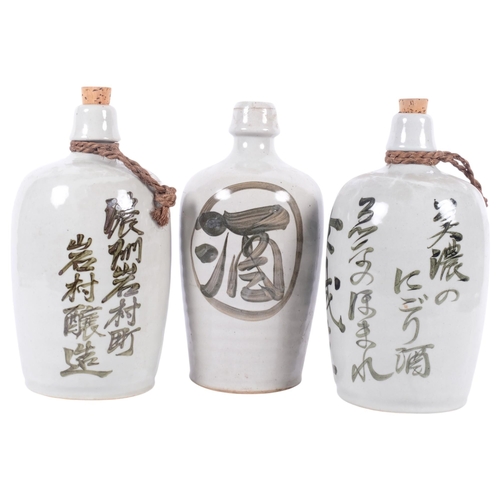 685 - 3 similar Japanese ceramic Sake bottles, H25.5cm