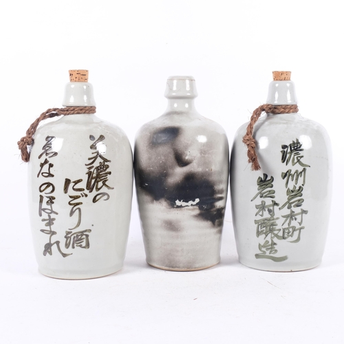 685 - 3 similar Japanese ceramic Sake bottles, H25.5cm