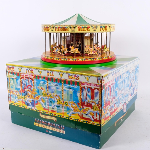 714 - A boxed Corgi model fairground attraction - the Southdown Gallopers, W27cm