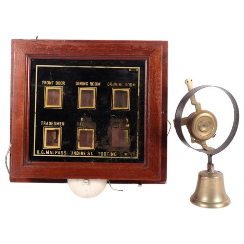 720 - A servants bell display unit, and a brass bell, H24.5cm