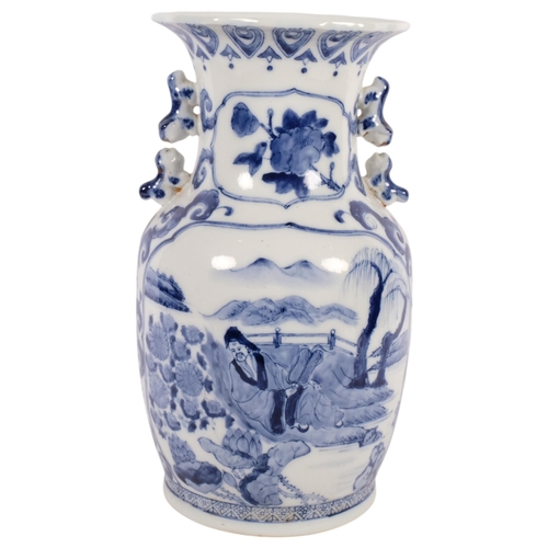 721 - A Chinese porcelain blue and white vase, with garden and lake scenes, 36.5cm