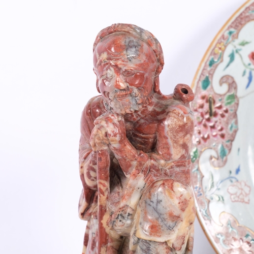 731 - Oriental carved soapstone figure, 19cm, a pair of Chinese famille rose plates (A/F), and a blue and ... 