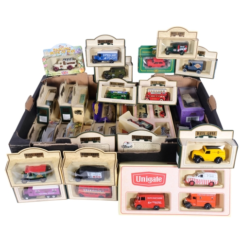 755 - A large collection of boxed Days Gone By and others diecast lorries, buses, trams, etc (boxful)