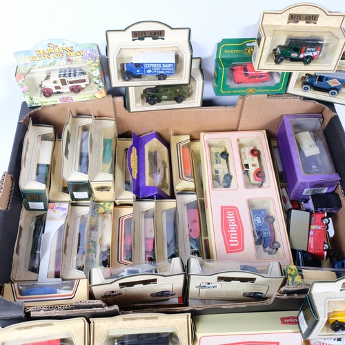 755 - A large collection of boxed Days Gone By and others diecast lorries, buses, trams, etc (boxful)