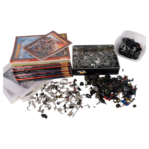 757 - A collection of metal plastic and unpainted Warhammer figures, Warhammer books, and other ephemera (... 