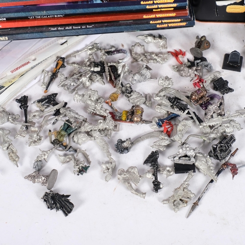 757 - A collection of metal plastic and unpainted Warhammer figures, Warhammer books, and other ephemera (... 