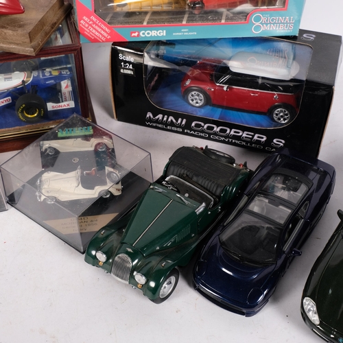 760 - A box of various diecast toys, including a Maisto Jaguar XK8, XC220, etc, some boxed