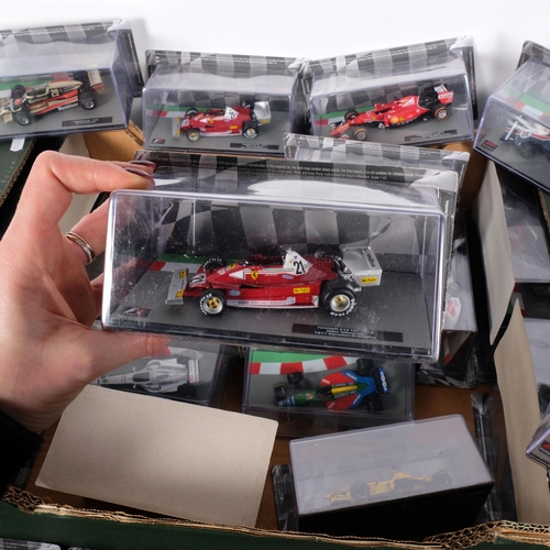 771 - A large quantity of boxed Formula 1 diecast racing cars (boxful)