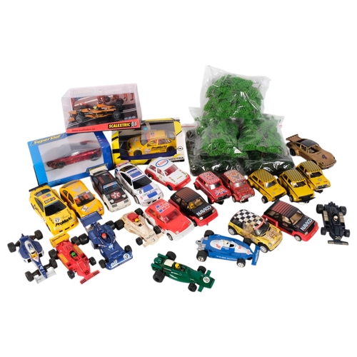 774 - A collection of loose Scalextric cars, including a Mini, Hornby Hobbies Rally Car, accessories, etc ... 