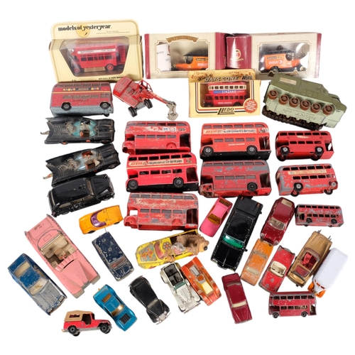 781 - A collection of play-worn diecast toys, including 2 Batmobiles, London buses, etc