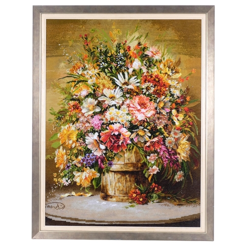 784 - An Iranian wall art picture, depicting a spray of flowers, 77cm x 89cm