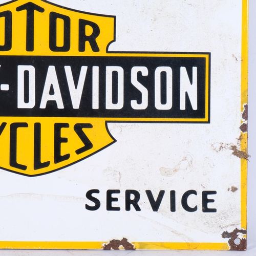 860 - A reproduction enamel sign advertising Harley-Davidson Motorcycles, 30cm x 40cm