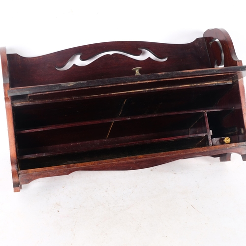 892 - An Edwardian mahogany table-top book rack, with fitted cupboard under, W46cm