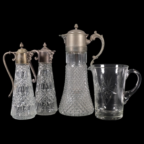 895 - 3 moulded glass Claret jugs with plated mounts, tallest 35cm, and a cut-glass water jug