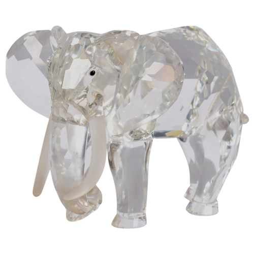 939 - SWAROVSKI - a Swarovski African elephant, H9cm, boxed