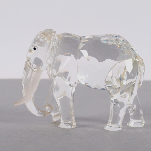 939 - SWAROVSKI - a Swarovski African elephant, H9cm, boxed