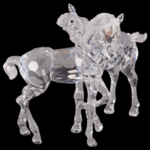 945 - SWAROVSKI - a model depicting 2 foals, H9cm, boxed