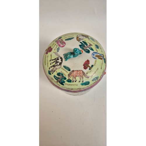 147 - A large Chinese famille vert circular box and cover, with enamel decoration of horses by a river, H2... 