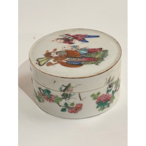 435 - A Chinese famille rose box and cover, cylindrical form with hand painted and gilded decoration, 7.5c... 