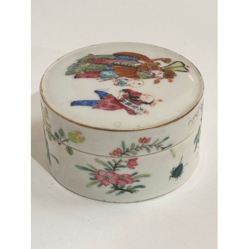 435 - A Chinese famille rose box and cover, cylindrical form with hand painted and gilded decoration, 7.5c... 