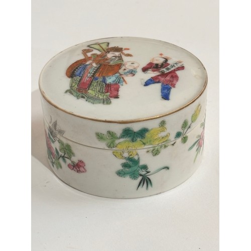 435 - A Chinese famille rose box and cover, cylindrical form with hand painted and gilded decoration, 7.5c... 