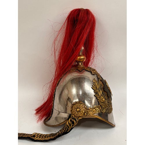 43 - A Household Cavalry Royal Horse Guards Officer's helmet, with red plume, applied brass laurel wreath... 