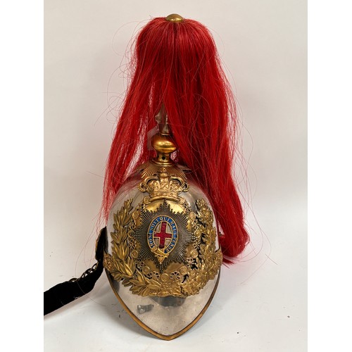 43 - A Household Cavalry Royal Horse Guards Officer's helmet, with red plume, applied brass laurel wreath... 