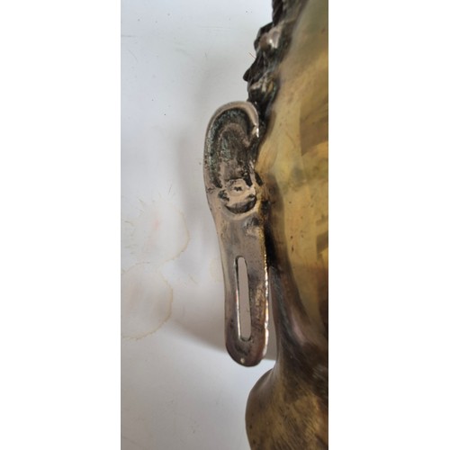 444 - A Tibetan bronze Buddha head, 30cm