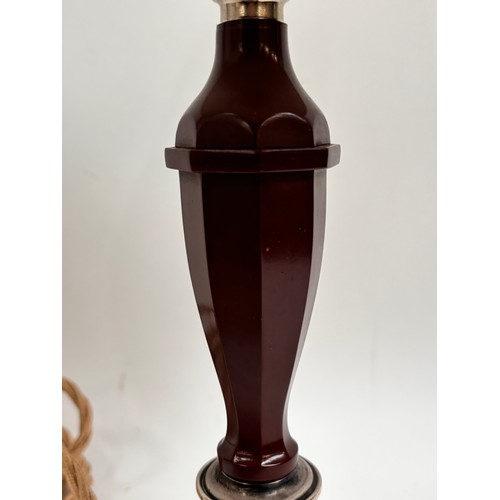 18 - A 1930s Art Deco table lamp in Bakelite, having a sterling silver base with martele finish, marked f... 