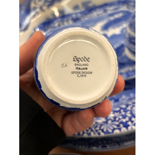 792 - A collection of Spode Italian blue and white tableware, including milk jug, cruet set, serving plate... 