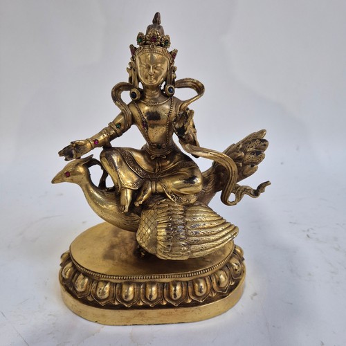 162 - A Tibetan bronze study of Mahamayuri, H23.5cm