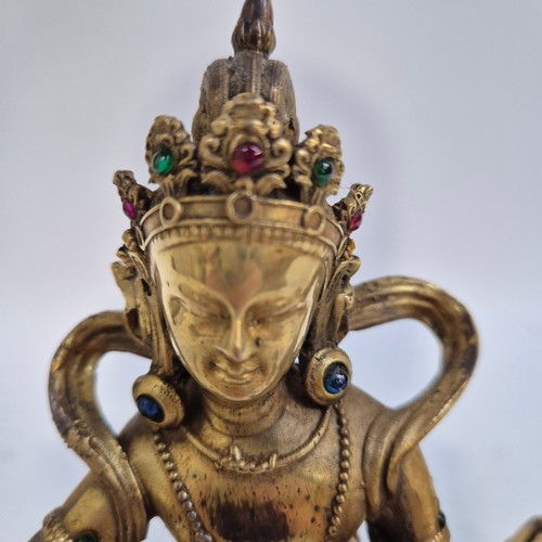 162 - A Tibetan bronze study of Mahamayuri, H23.5cm