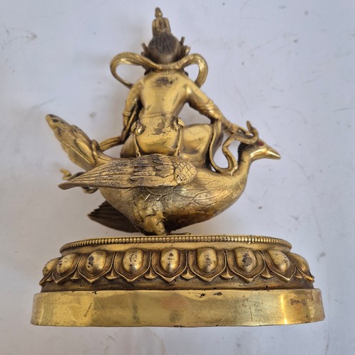 162 - A Tibetan bronze study of Mahamayuri, H23.5cm