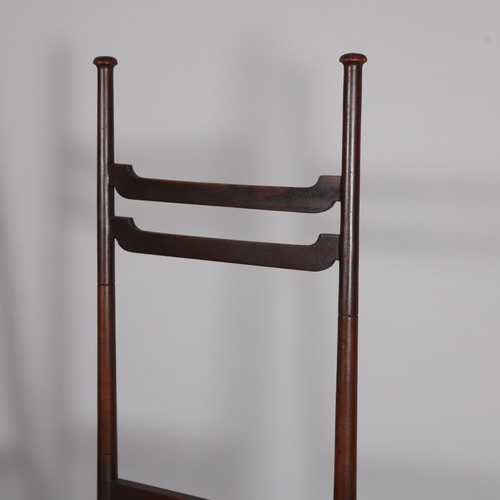 35 - A pair of late Victorian Aesthetic or Arts and Crafts high-back chairs, in the manner of EW Godwin, ... 