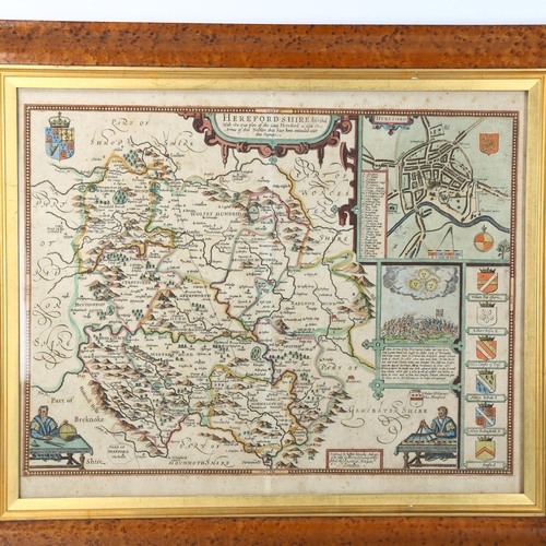 517 - A 17th Century hand coloured map of Herefordshire by John speede, 52 x42cm, framed